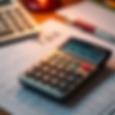 A calculator and tax forms on a desk